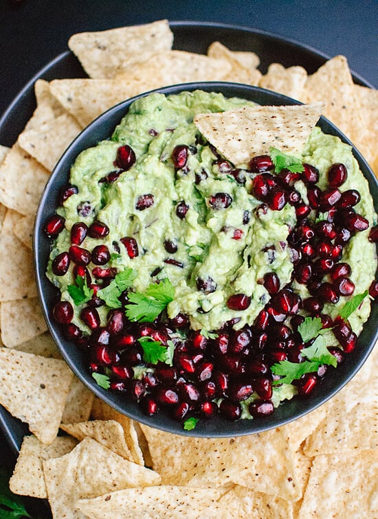 Festive pomegranate guacamole, perfect for holiday parties or as a snack! - cookieandkate.com
