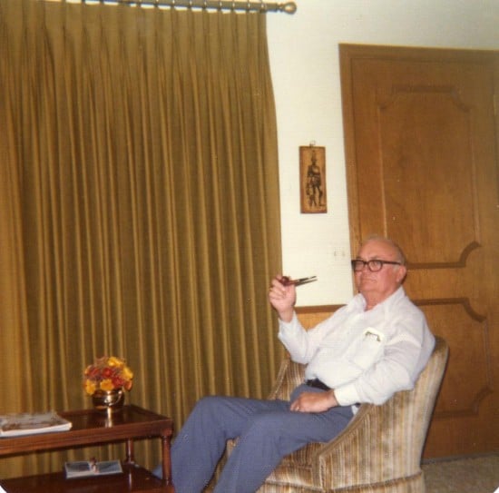 my grandfather at home with a cigar in the 70s