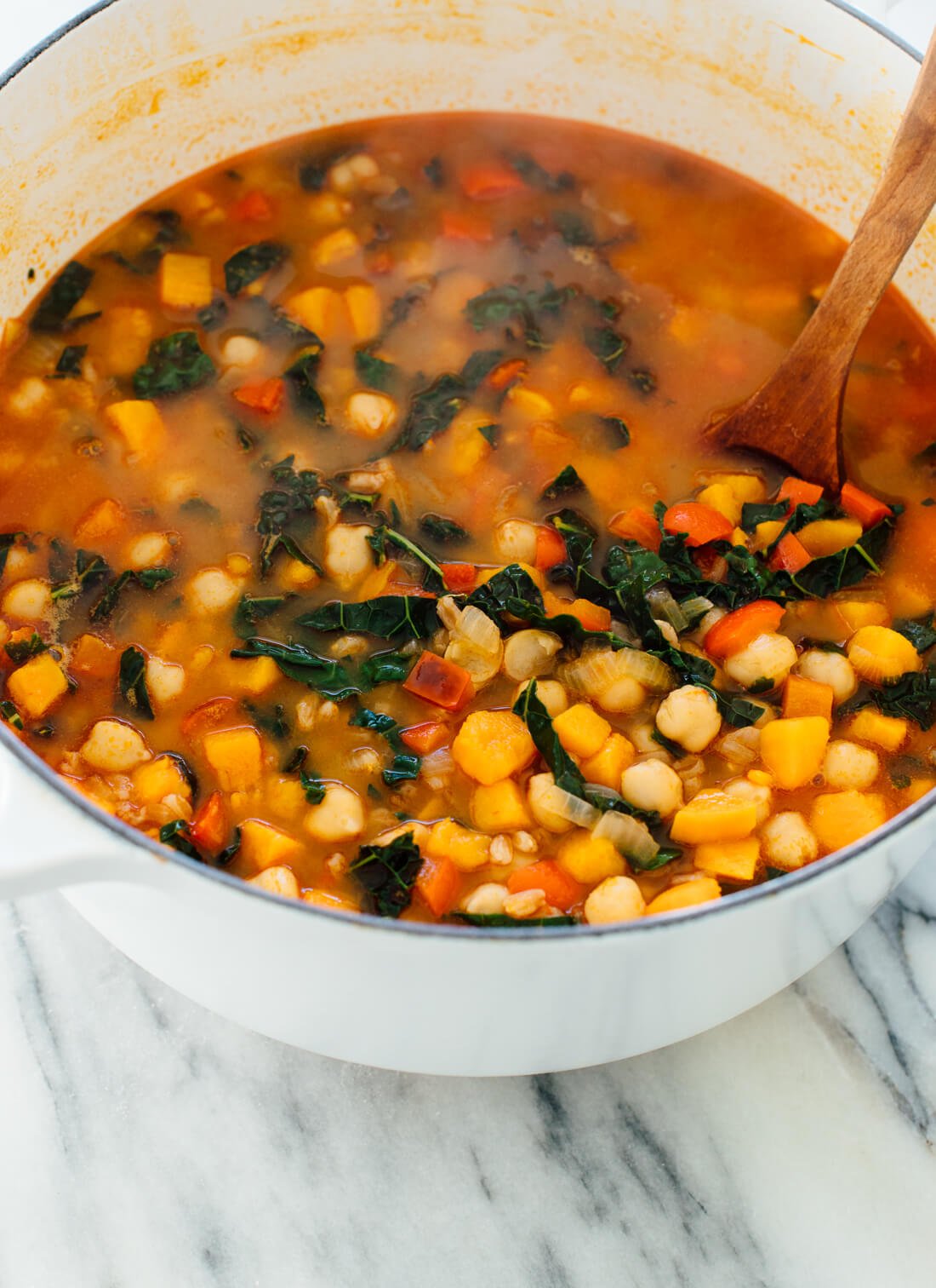 Warm up with this hearty sweet potato, kale and chickpea soup!