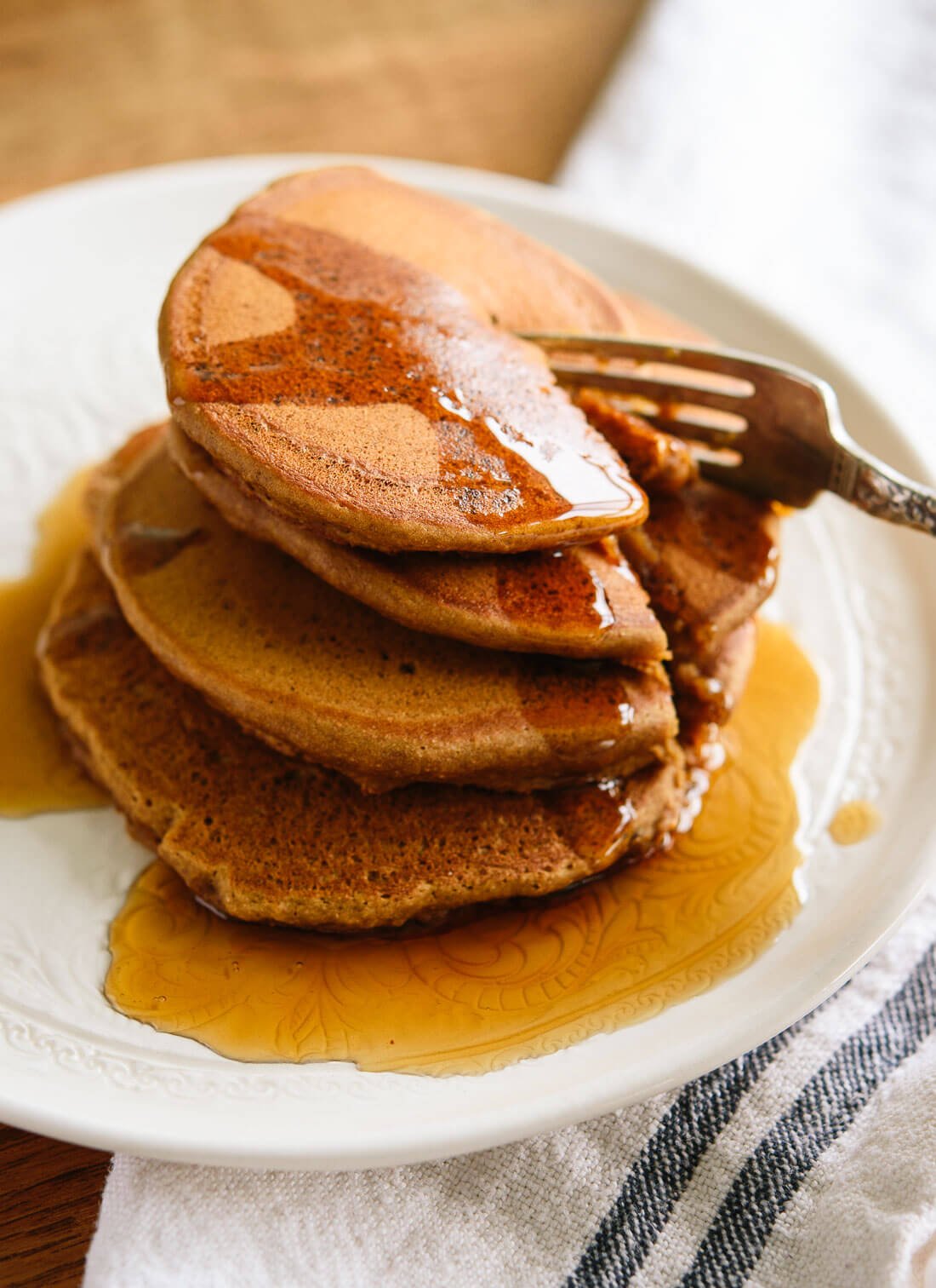 Fluffy and wholesome gingerbread pancakes! Get the recipe at cookieandkate.com
