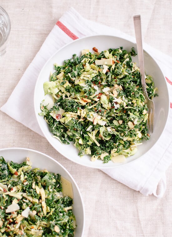 Raw kale and brussels sprouts salad with tahini-maple dressing