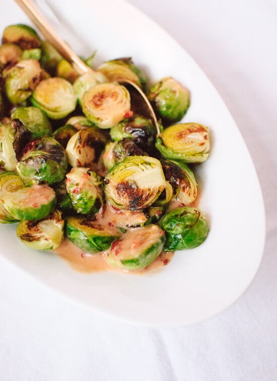 Quick roasted brussels sprouts with coconut ginger sauce recipe: a simple, vegan and gluten-free side dish ready in 15 minutes | cookieandkate.com