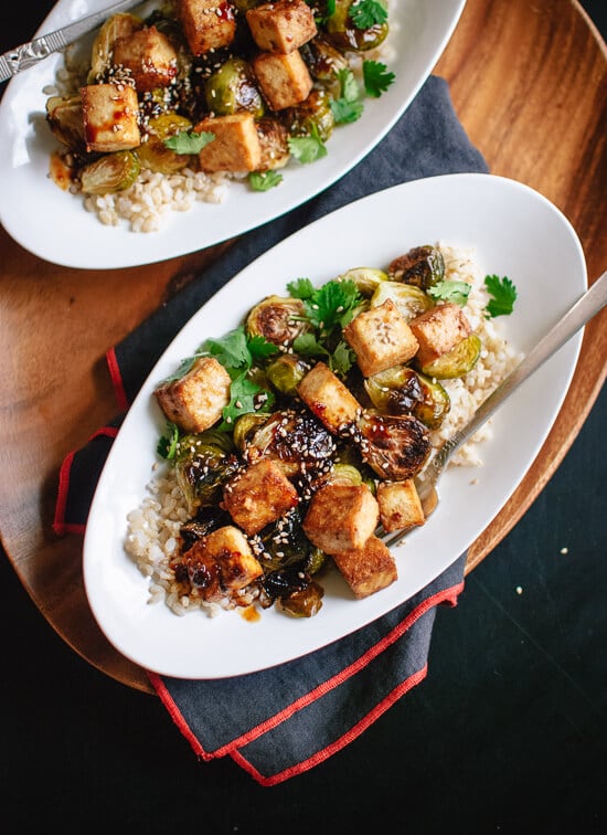 Roasted brussels sprouts and crispy baked tofu with honey-sesame glaze - cookieandkate.com