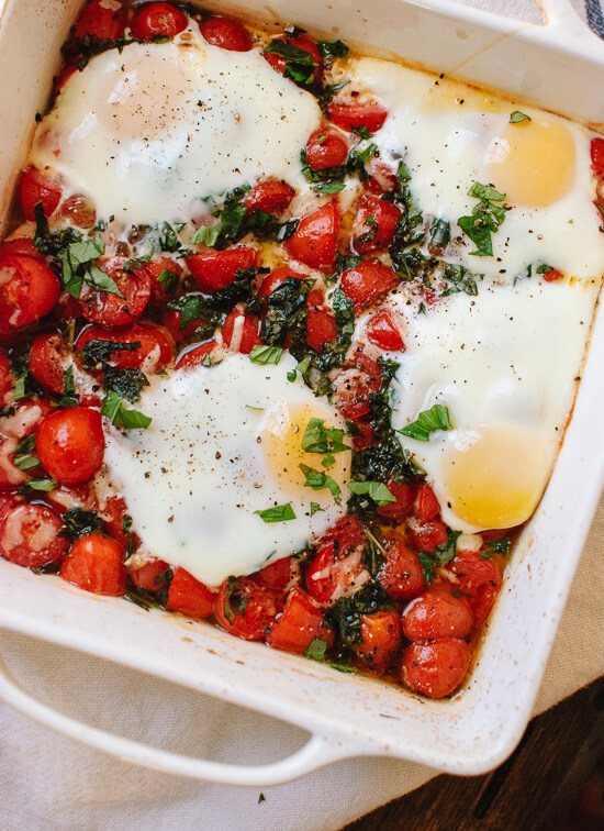 Baked eggs on roasted cherry tomatoes - cookieandkate.com