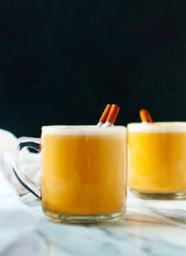 Homemade pumpkin chai lattes made with real pumpkin, almond milk, maple syrup and spices—rich and creamy, naturally sweetened and only 90 calories!