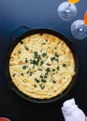 Savory butternut squash and Parmesan frittata with fried sage on top - cookieandkate.com