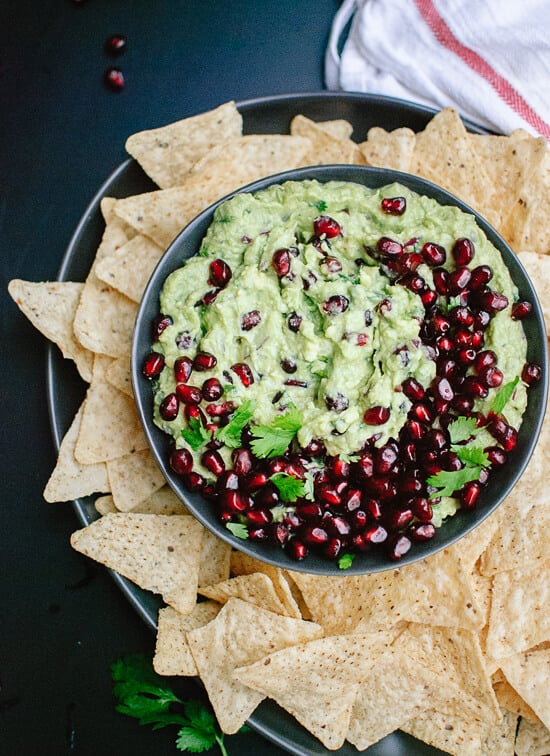 Pomegranate guacamole is a beautiful and healthy holiday snack! #vegan  - cookieandkate.com