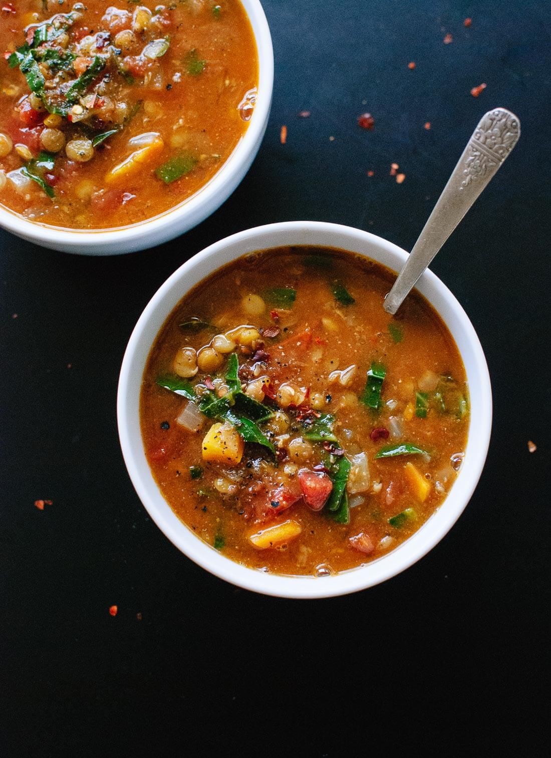 This healthy, Mediterranean-flavored lentil soup is made with (mostly) pantry ingredients! Vegan and gluten free. cookieandkate.com