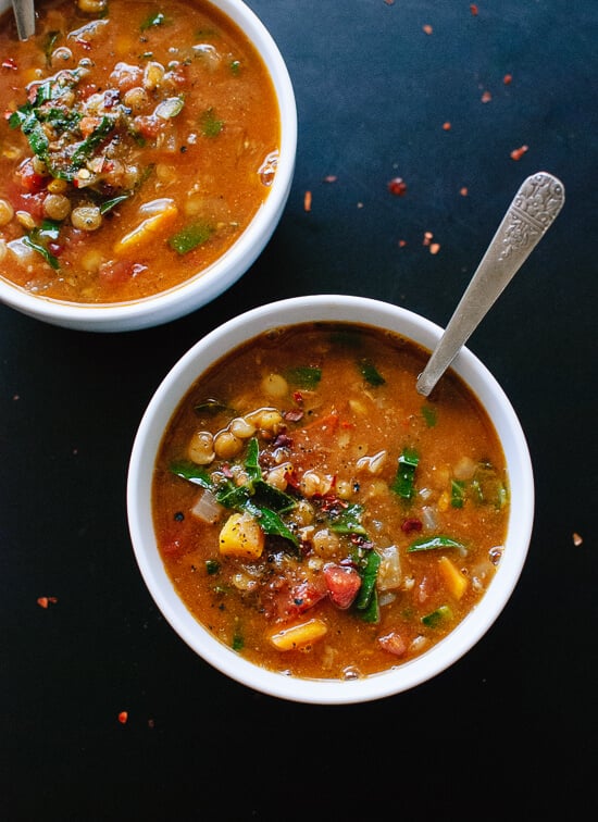 This healthy Mediterranean-flavored lentil soup is made with (mostly) pantry ingredients! Vegan and gluten-free. cookieandkate.com