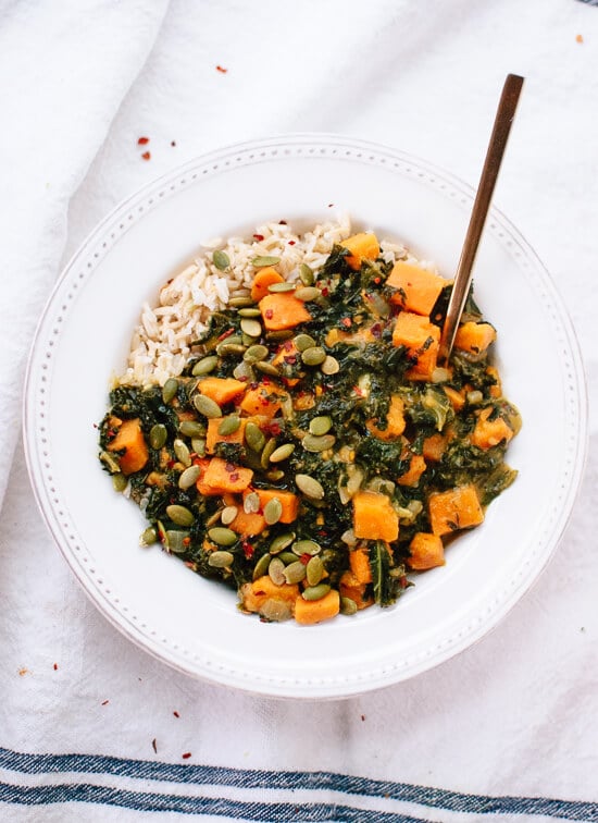 Hearty coconut curried kale and sweet potato recipe - cookieandkate.com