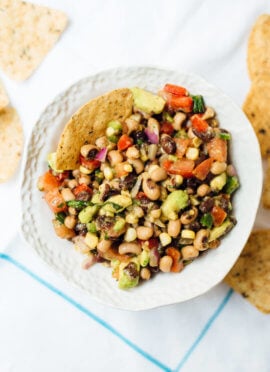 This homemade cowboy caviar is a popular Southern bean salad/salsa. It's always a hit at summer potlucks and it's healthy, too. cookieandkate.com