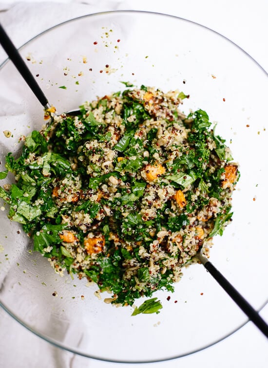 Healthy and delicious quinoa salad with roasted sweet potato kale and pesto vinaigrette - cookieandkate.com