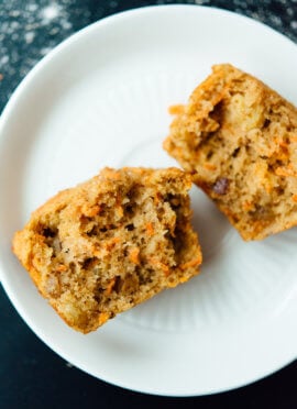 Healthy carrot muffins that taste amazing! These are made with whole wheat flour and sweetened with maple syrup!
