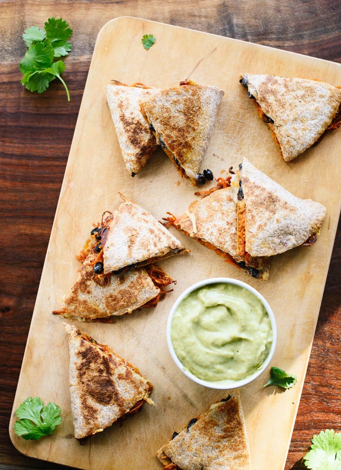 Sweet potato black bean quesadillas with creamy avocado salsa verde (you can make these without a spiralizer, too!) - cookieandkate.com