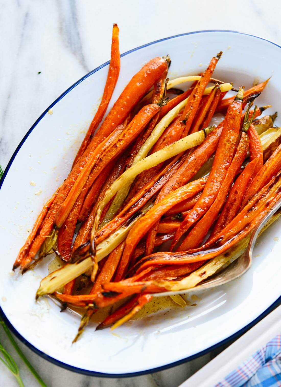 Roasted carrots with honey butter on a serving platter