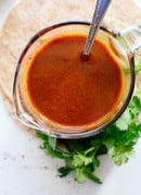 Easy homemade enchilada sauce is so easy! This sauce tastes so good, you'll never go back to the store-bought kind. Perfect for your other Mexican recipes, too! cookieandkate.com