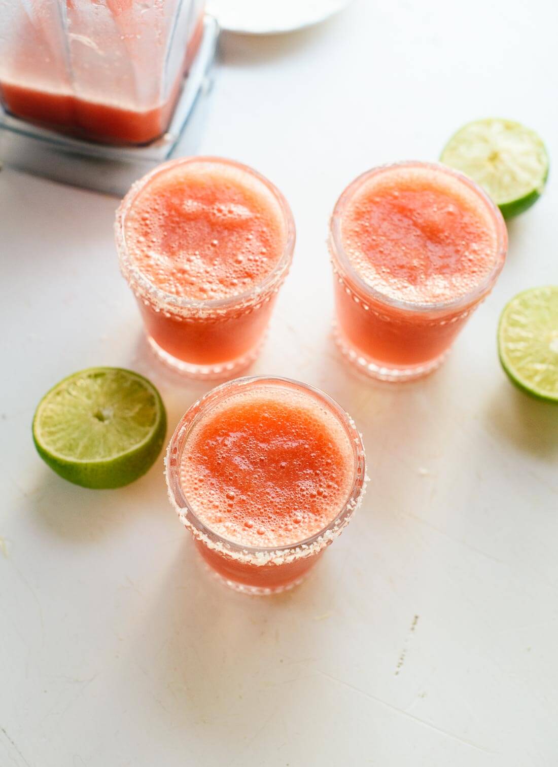 Cold strawberry margaritas are perfect for spring/summer parties! Ready in 10 minutes. cookieandkate.com