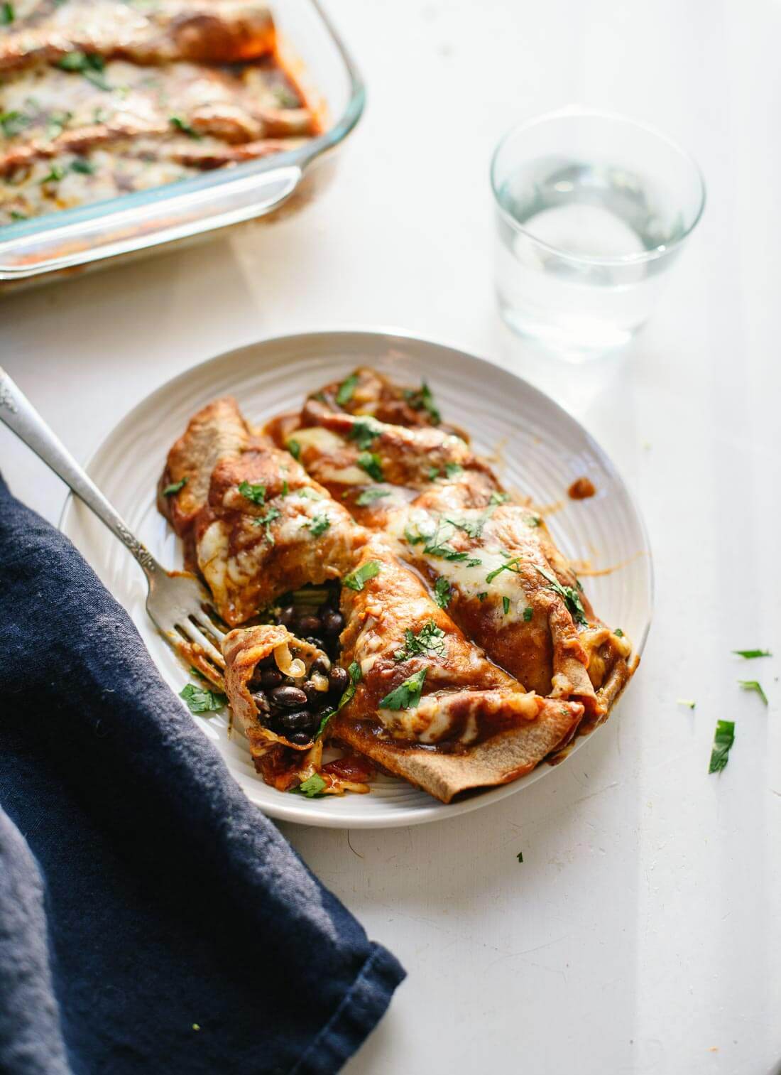 Delicious vegetable enchiladas with black beans and homemade red sauce - cookieandkate.com