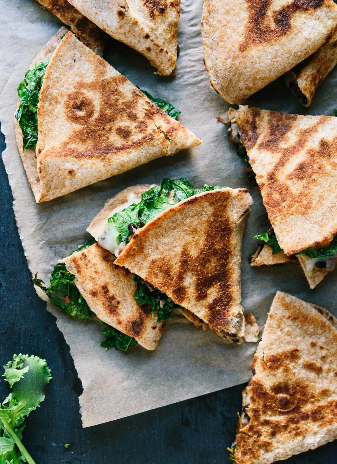 Crispy quesadillas stuffed with broccoli rabe and black beans! cookieandkate.com