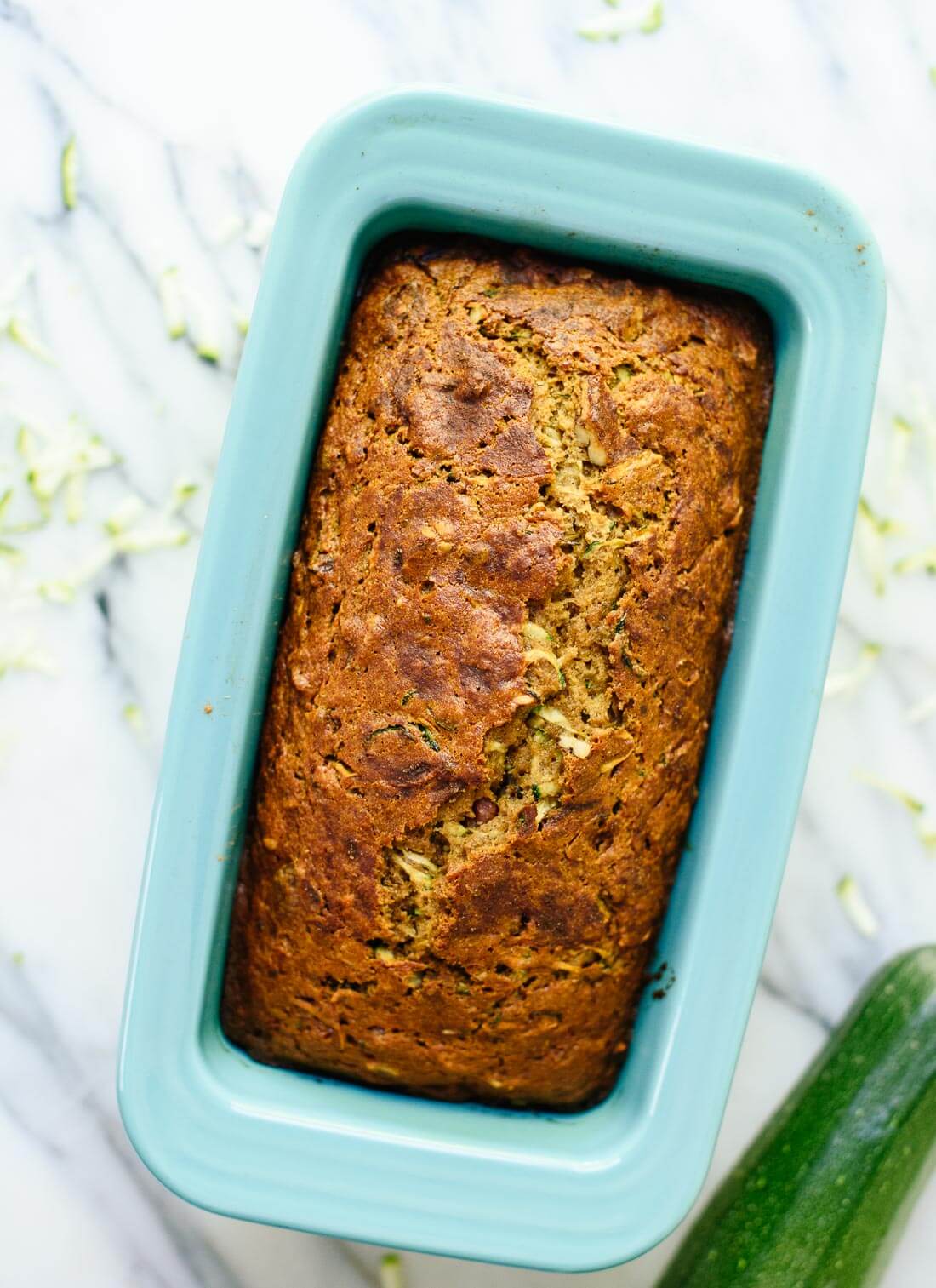 Zucchini loaf made with lots of fresh zucchini, honey, coconut oil, whole wheat flour and nuts! cookieandkate.com