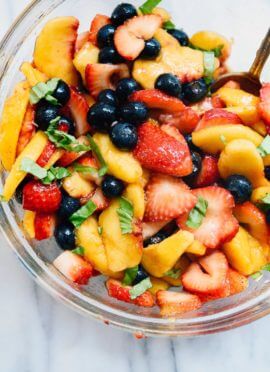 Take advantage of ripe summer fruit to make this simple summertime fruit salad! Peaches, strawberries, blueberries, and balsamic vinegar make a killer fruit salad. cookieandkate.com