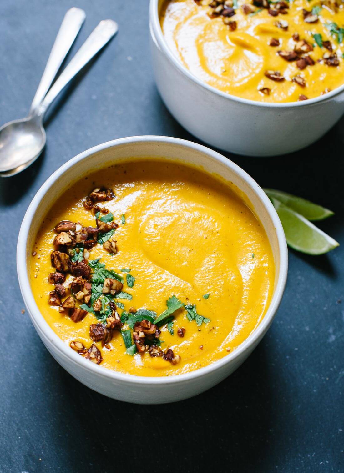 This nutritious, Thai-spiced carrot and sweet potato soup will warm you right up! cookieandkate.com