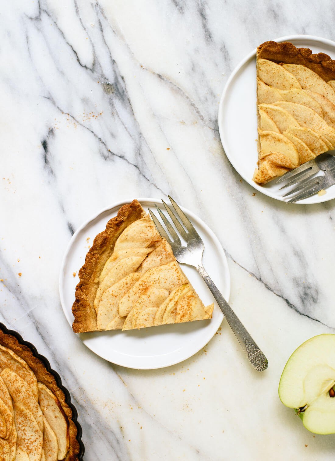 This delicious apple tart features an easy crust made with almond and oat flour. It's fool-proof! cookieandkate.com