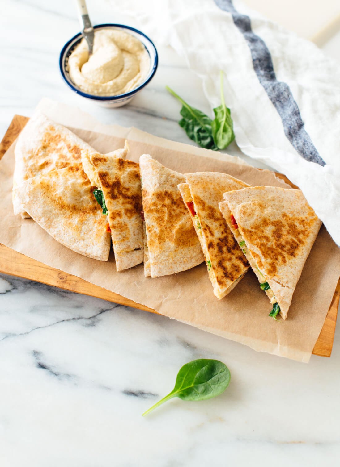 This hummus quesadilla recipe is simple, quick and healthy, too! Dairy-free and vegan (also gluten-free if you use gluten-free tortillas). Get the recipe at cookieandkate.com