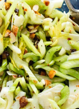 This celery salad recipe will surprise you! Crisp celery, toasted almonds, sweet dates and Parmesan combine to create a delicious, crisp, fresh salad. cookieandkate.com