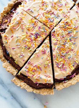 This chocolate peanut butter tart recipe is made with wholesome ingredients and tastes incredible! cookieandkate.com