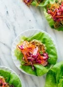 These healthy lettuce wraps are colorful, fun to eat, and so delicious! They're vegetarian/vegan, and easily gluten free. Get the recipe at cookieandkate.com