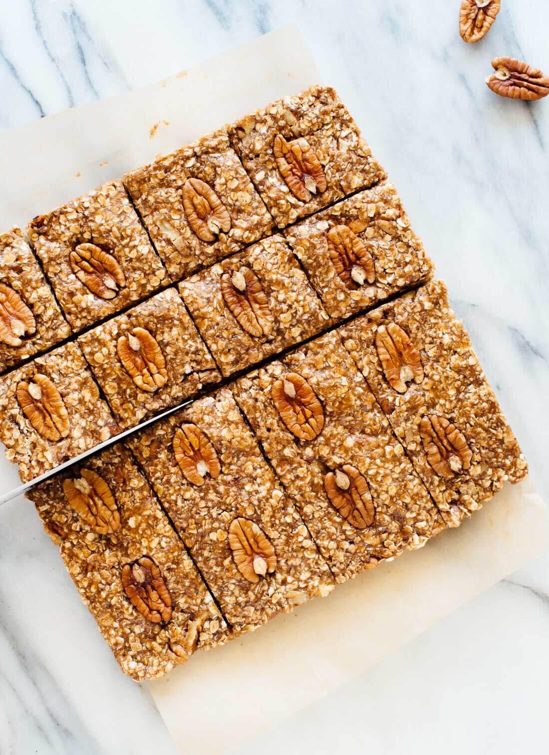 These no-bake pecan granola bars taste one million time better than store-bought granola bars! They're gluten free and vegan, too. Get the recipe at cookieandkate.com