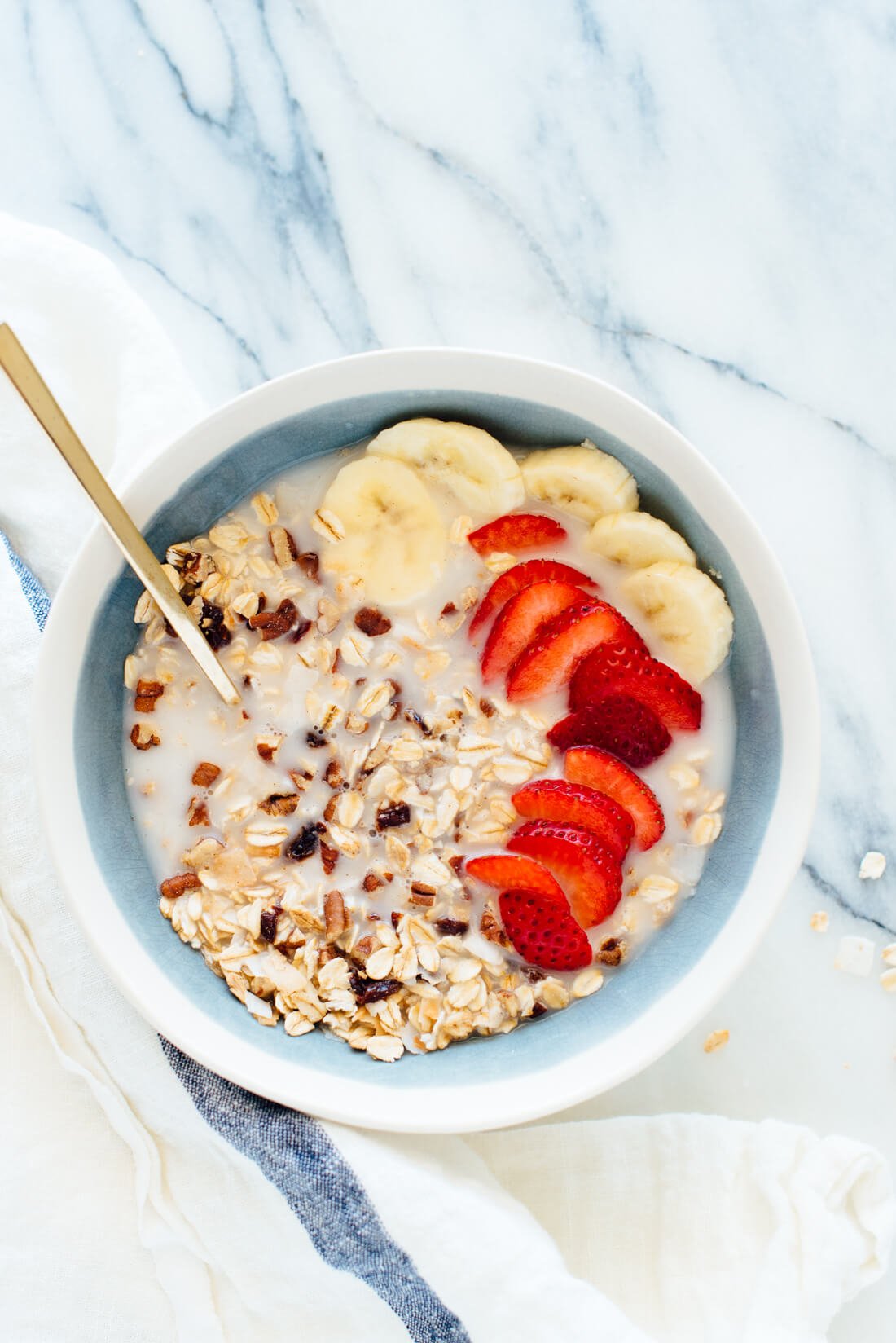This cherry pecan muesli recipe will make you look forward to breakfast! It's made with old-fashioned oats, coconut, pecans and dried cherries, with a touch of maple syrup. cookieandkate.com