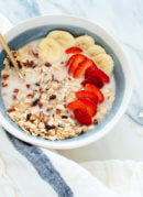 This healthy homemade muesli is absolutely delicious! Oats, pecans, coconut, dried cherries, and a touch of maple syrup and vanilla.