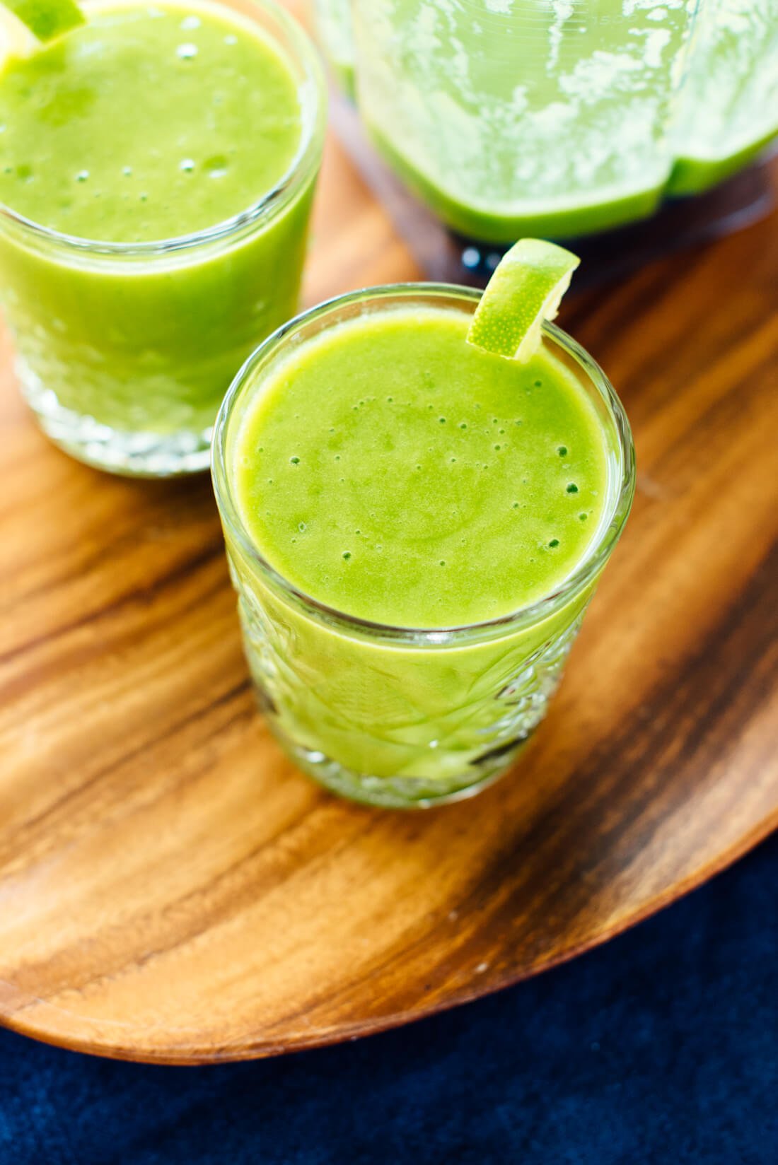 This mango green smoothie recipe tastes like a treat! Your whole family will love it. cookieandkate.com