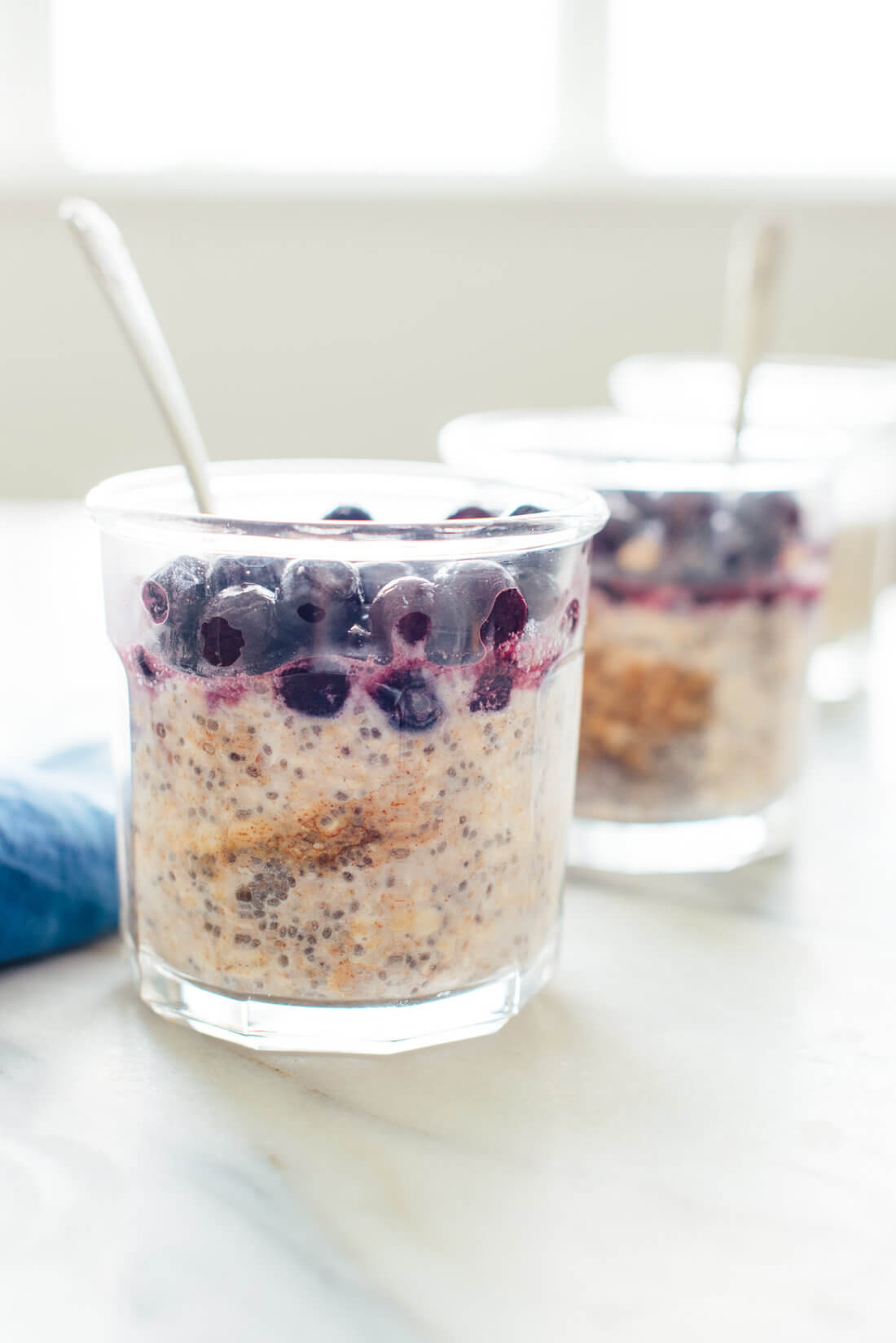 This is a healthy and delicious breakfast! Overnight oats with blueberries and almond butter (gluten free and vegan) - cookieandkate.com