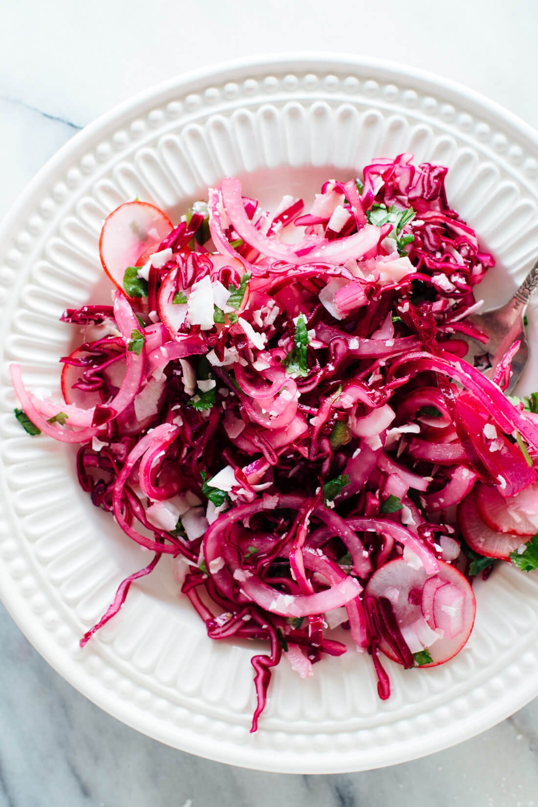 Coconut lovers, you're going to love this coconut cabbage slaw recipe! Get it at cookieandkate.com #vegan #glutenfree