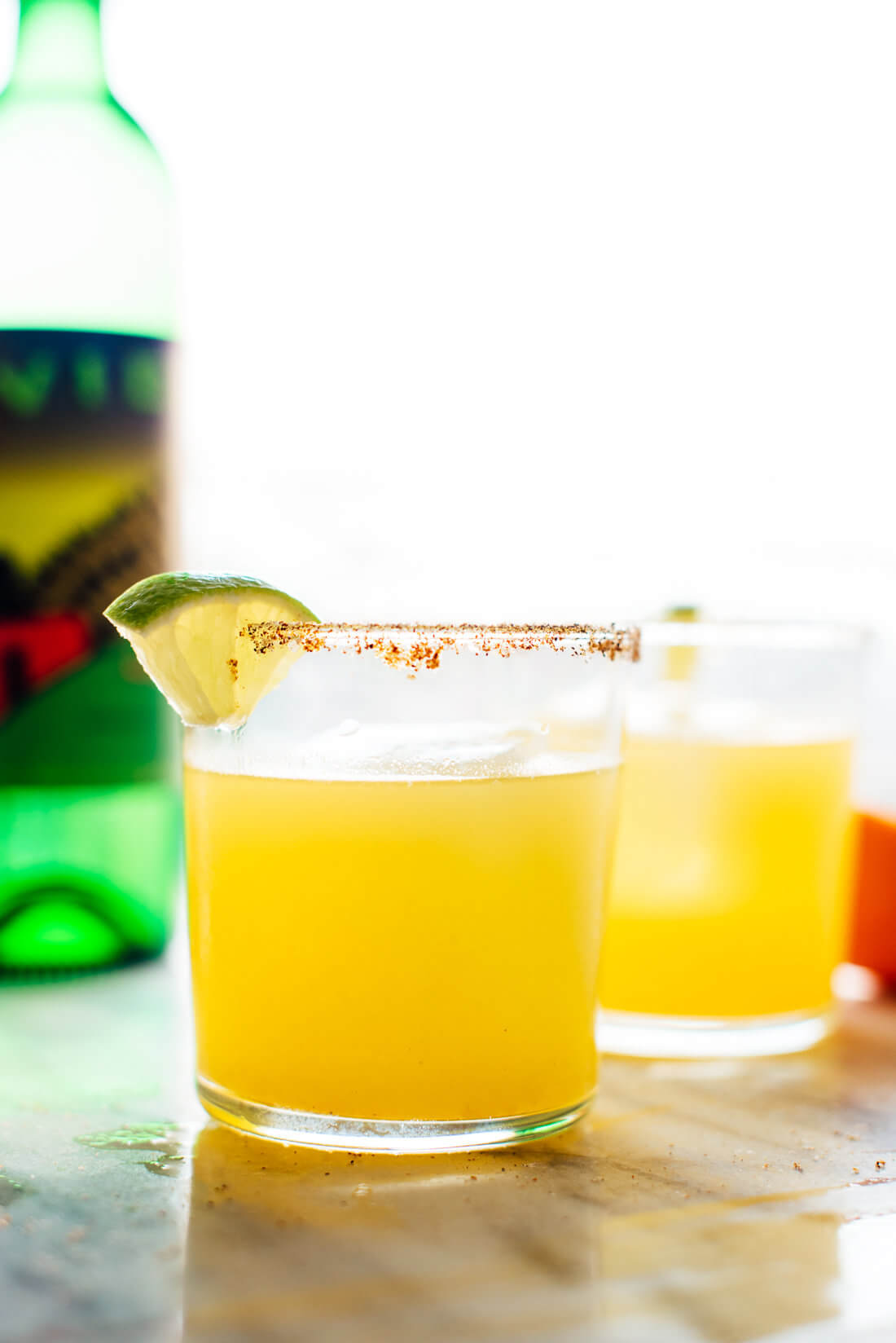 Learn how to make mezcalitas at home with mezcal, fresh orange and lime juice! Get the recipe at cookieandkate.com