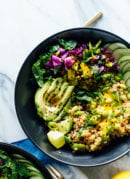 The ultimate Buddha bowl recipe, featuring cooked brown rice, steamed and raw veggies, avocado and an addictive carrot-ginger sauce. #vegan #vegetarian