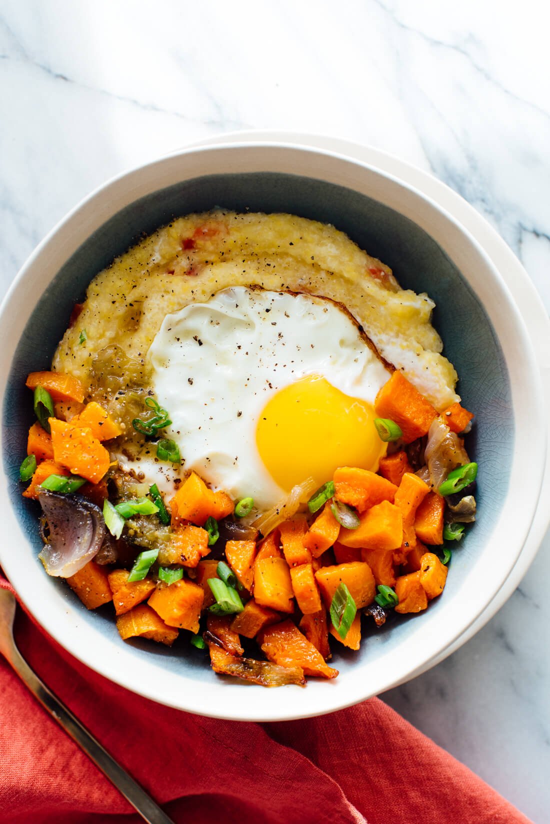 Here's a brunch-worthy meal that you can serve for dinner, too! This goat cheese polenta recipe is full of vegetables.