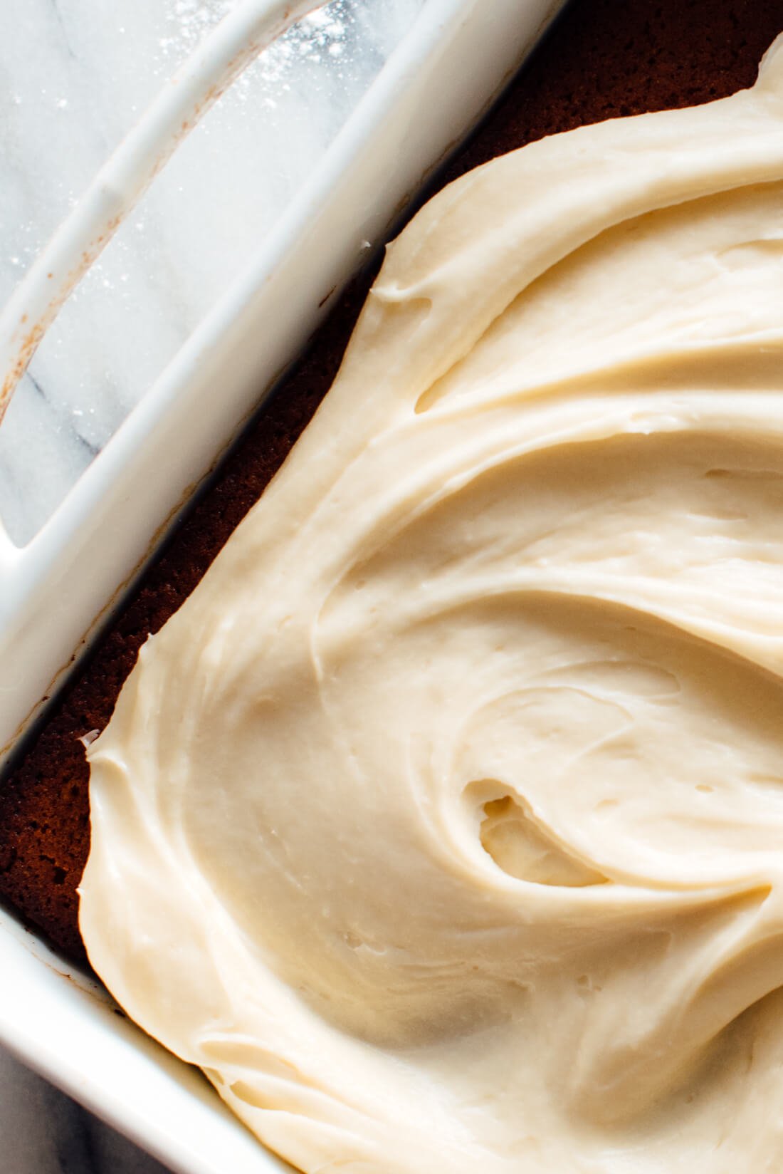 Naturally sweetened gingerbread cake with rich cream cheese frosting on top