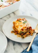 My favorite vegetable lasagna recipe, made with zucchini, bell pepper, carrots and spinach! No one will miss the meat in this #vegetarian #lasagna.