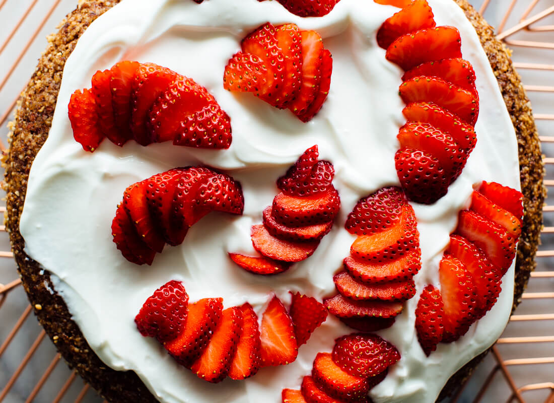 almond cake with strawberries and yogurt on top