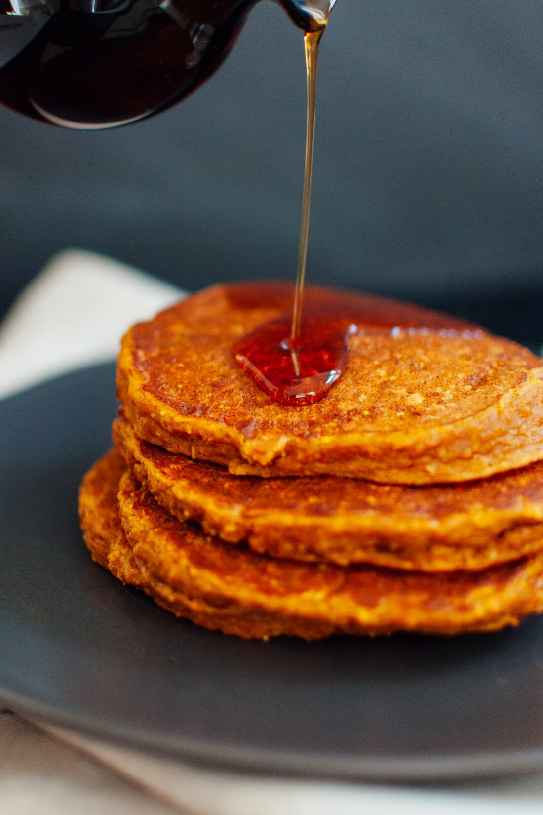 Delicious gluten-free pumpkin pancakes made with only one flour—oat flour!