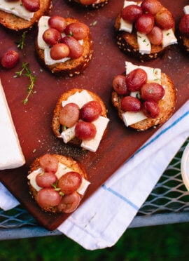 Jammy roasted grapes on brie and toast make a simple, seasonal appetizer!