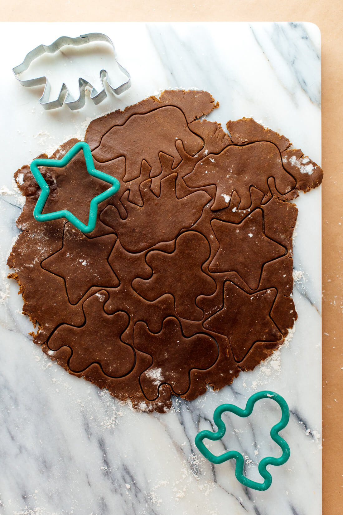 making shapes in healthy gingerbread cookie dough