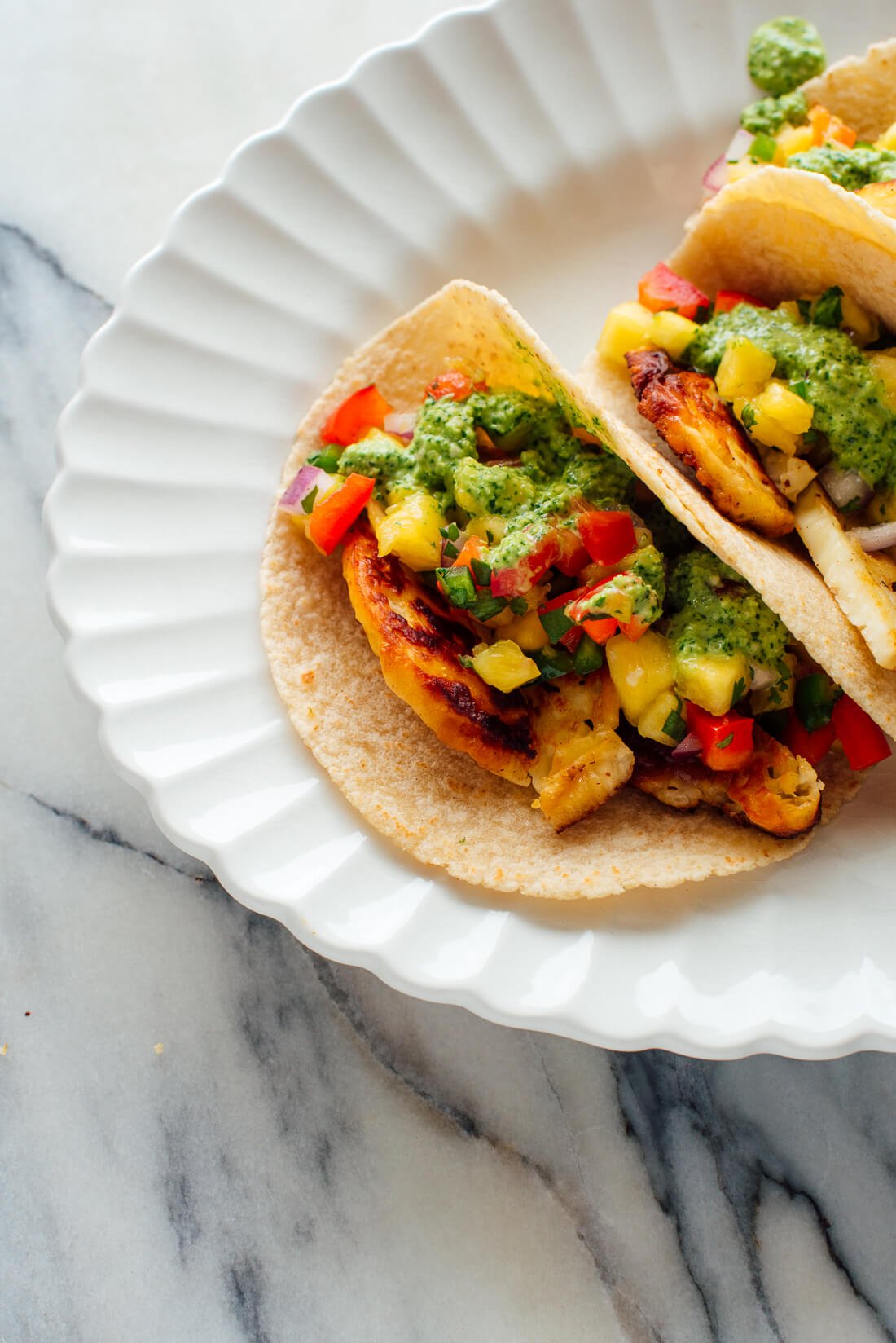 vegetarian tacos with pineapple salsa fried halloumi and aji verde