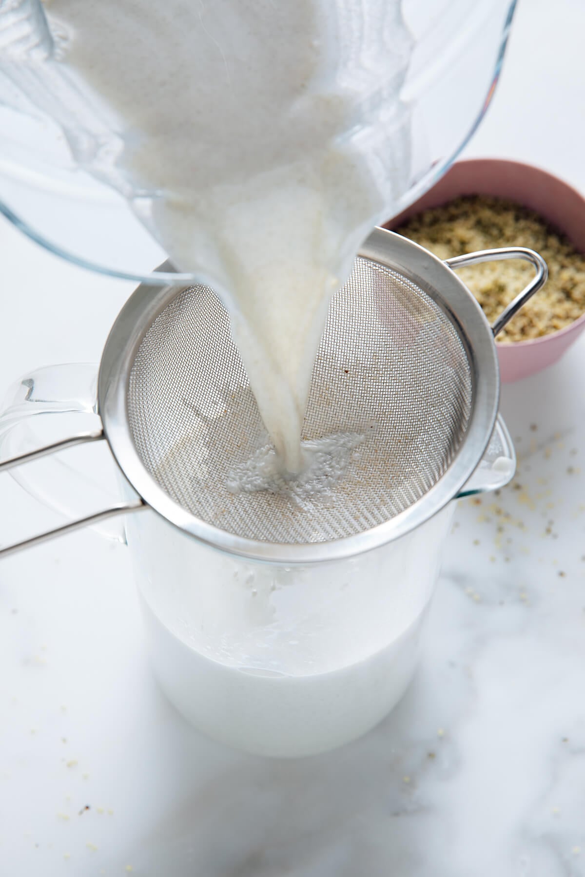 straining hemp milk