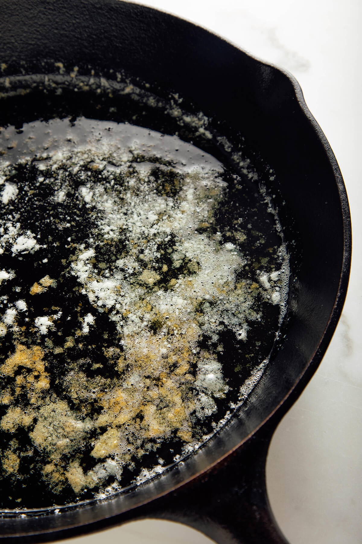 melted butter in skillet